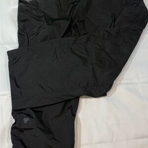 Aritzia TnAction Prima Track Pants Black XL Teachwear Windbreaker Adjustable Hem